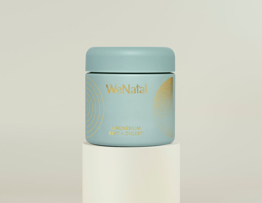 Rest & Digest Magnesium Welcome Kit, featuring a blue cylindrical bottle with gold lettering, designed for skincare and wellness, highlighting its use in prenatal health support.