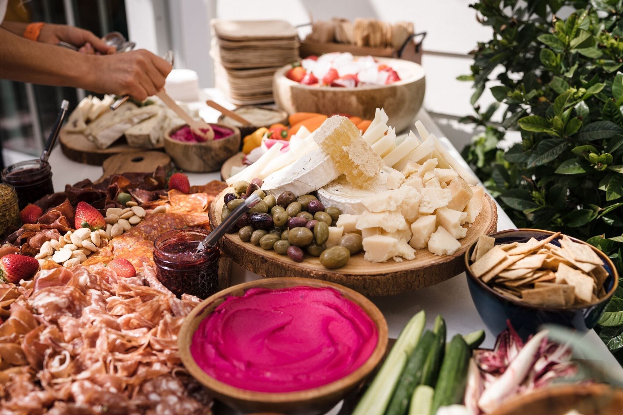 holiday table with charcuterie boards of meats, cheeses, vegetables, and dips - WeNatal prenatal