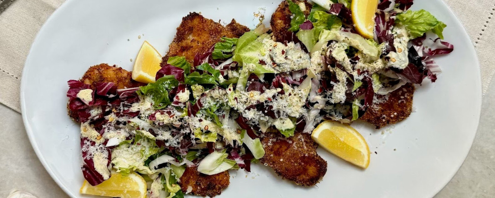 Oven-Baked Chicken Milanese with Chicory Caesar Salad - fertility dinner recipes - Wenatal