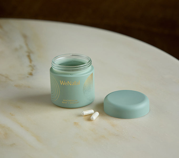 WeNatal Rest & Digest Magnesium Welcome Kit featuring a teal jar with capsules, supporting prenatal nutrition and fertility with essential nutrients for daily support