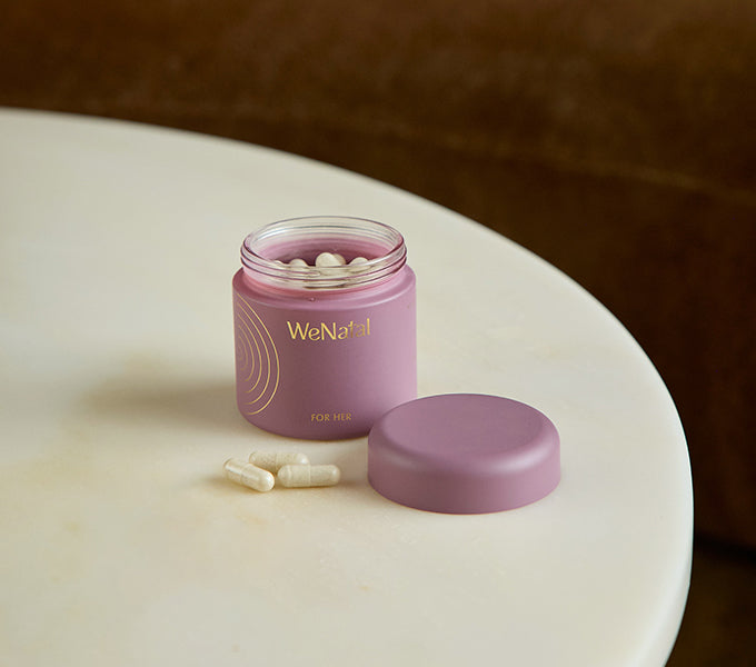 WeNatal For Her & Egg Quality+ Duo Welcome Kit features a jar of prenatal supplement capsules, offering daily support for prenatal nutrition and fertility