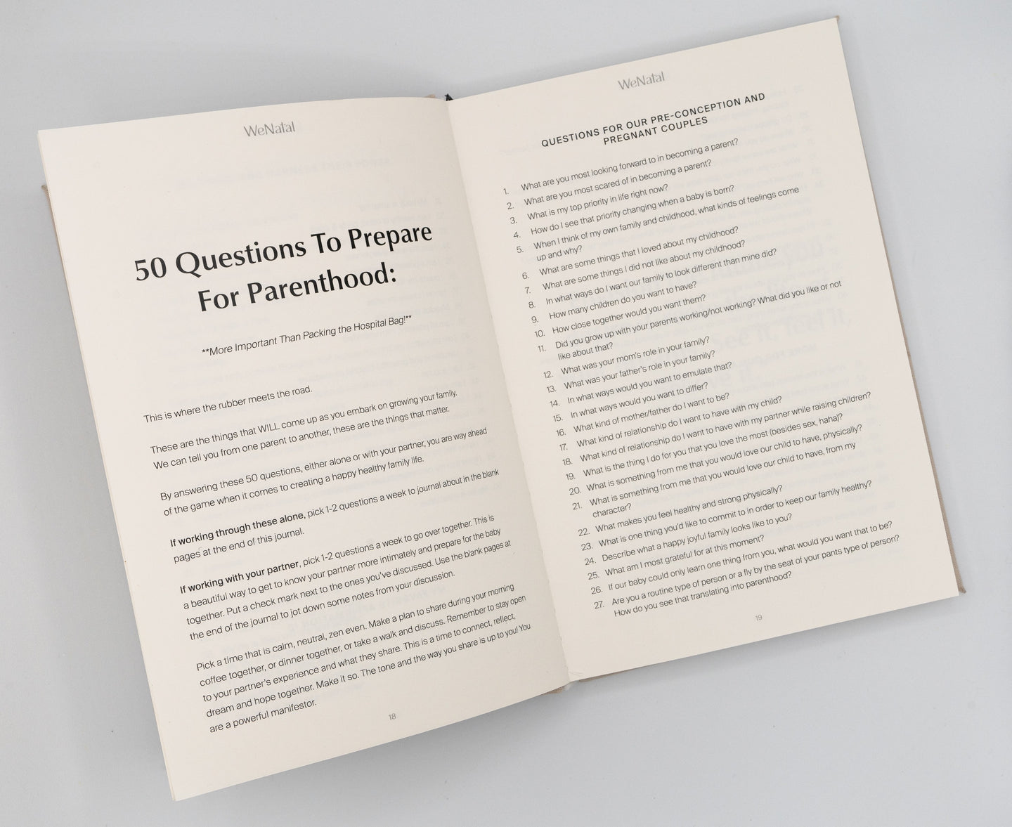 WeNatal journal opened to 50 questions to prepare for parenthood