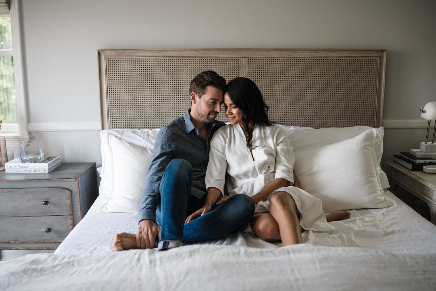 couple sitting on bed