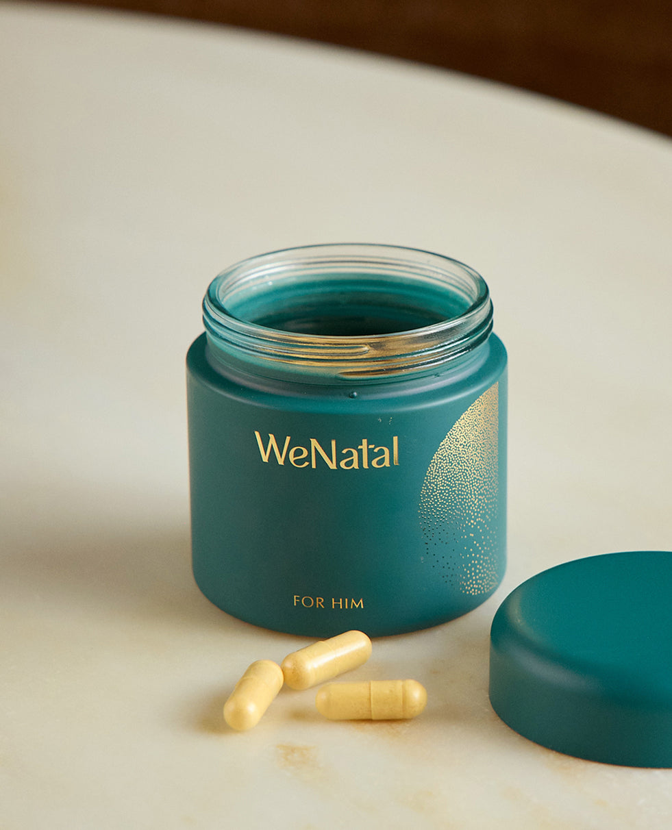 WeNatal For Him Welcome Kit includes a teal-green glass jar with 90 capsules, offering prenatal nutrition, daily nutrient, and fertility support tailored for men