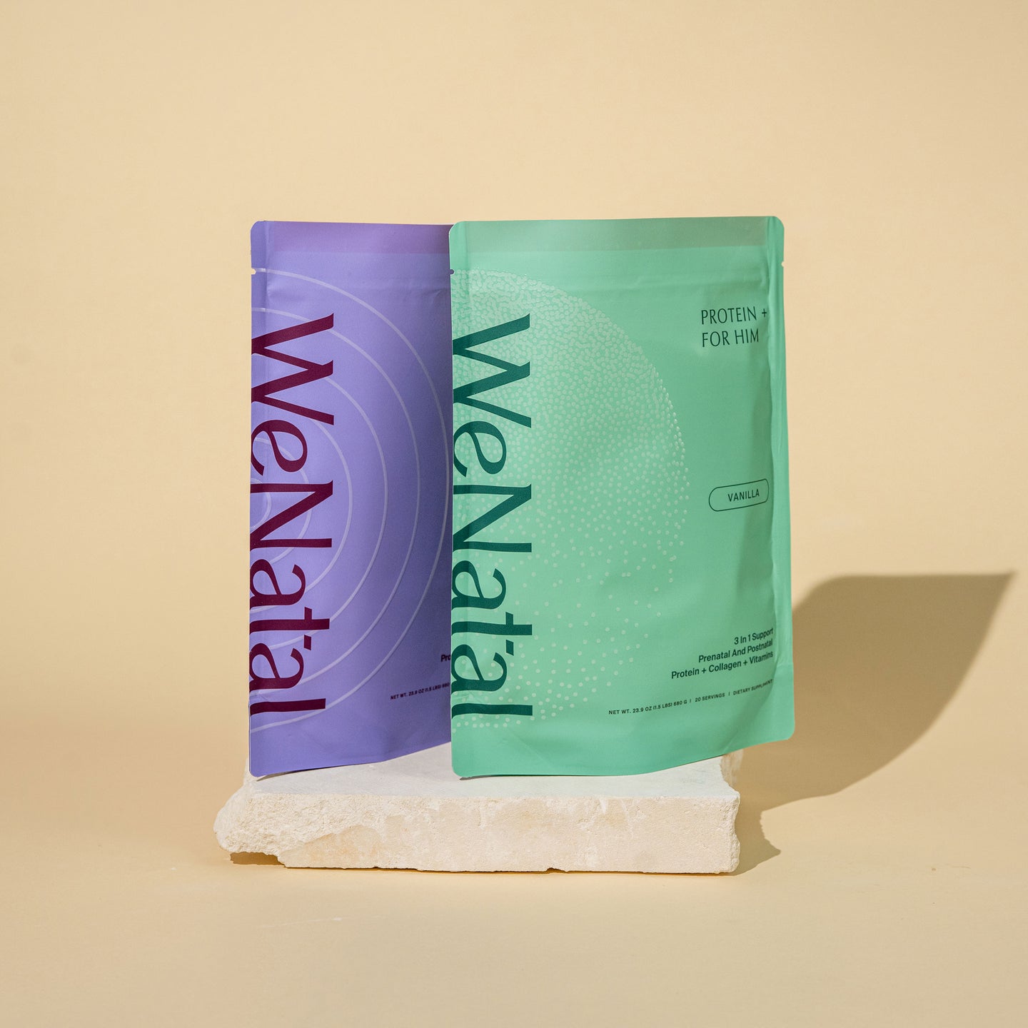 WeNatal Protein+ Together supplements, featuring a mint-green pouch for men's vanilla-flavored protein with collagen and vitamins, alongside a companion purple pouch in a studio setting.