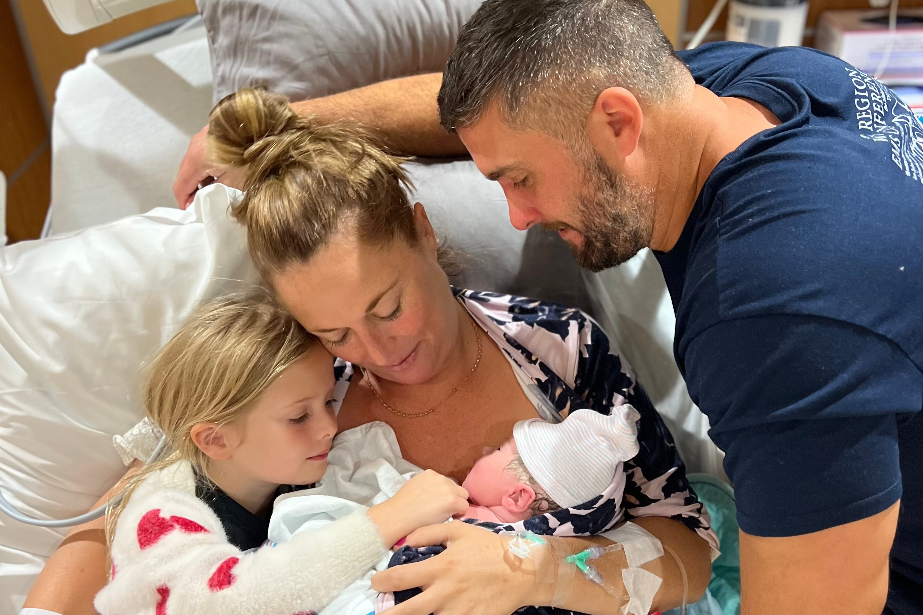 kimberly with her husband and daughter welcoming their sweet baby boy - WeNatal prenatal - WeNatal Diary