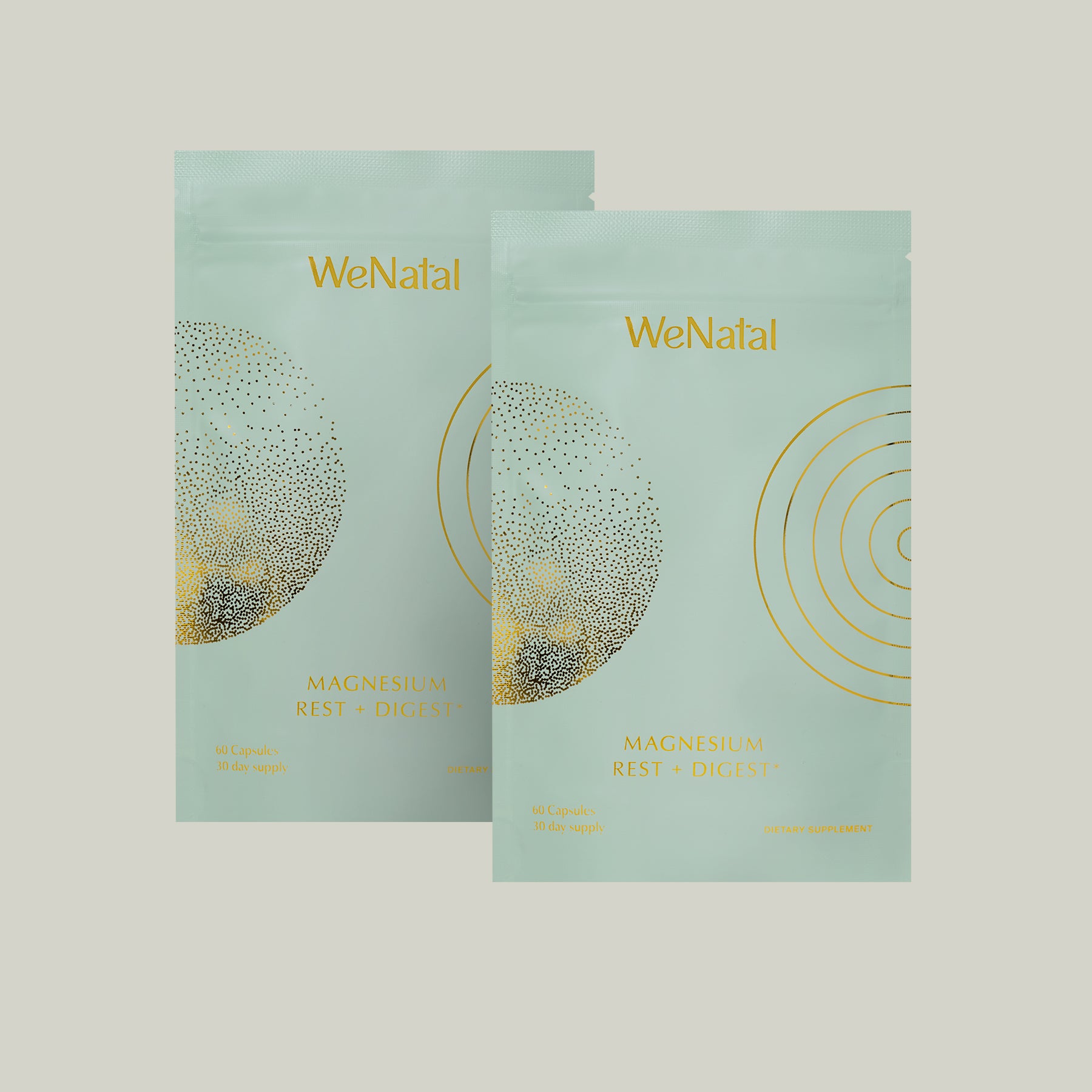 WeNatal Rest + Digest Magnesium Together Welcome Kit, featuring two light-green pouches with 60 capsules each, designed for a 30-day dual-person supply