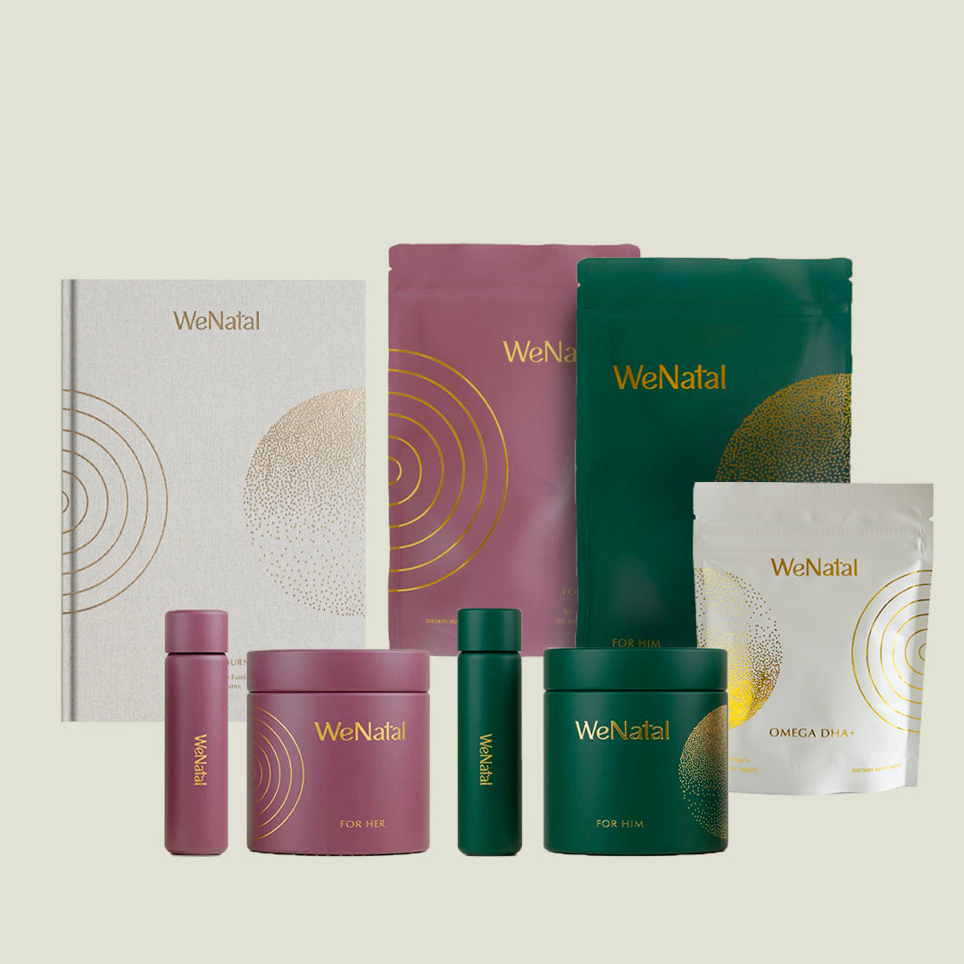 WeNatal Manifestation Journal, We Natal For Her and For Him refill pouches, travel vials, glass jars and WeNatal Fish Oil refill pouch neatly displayed