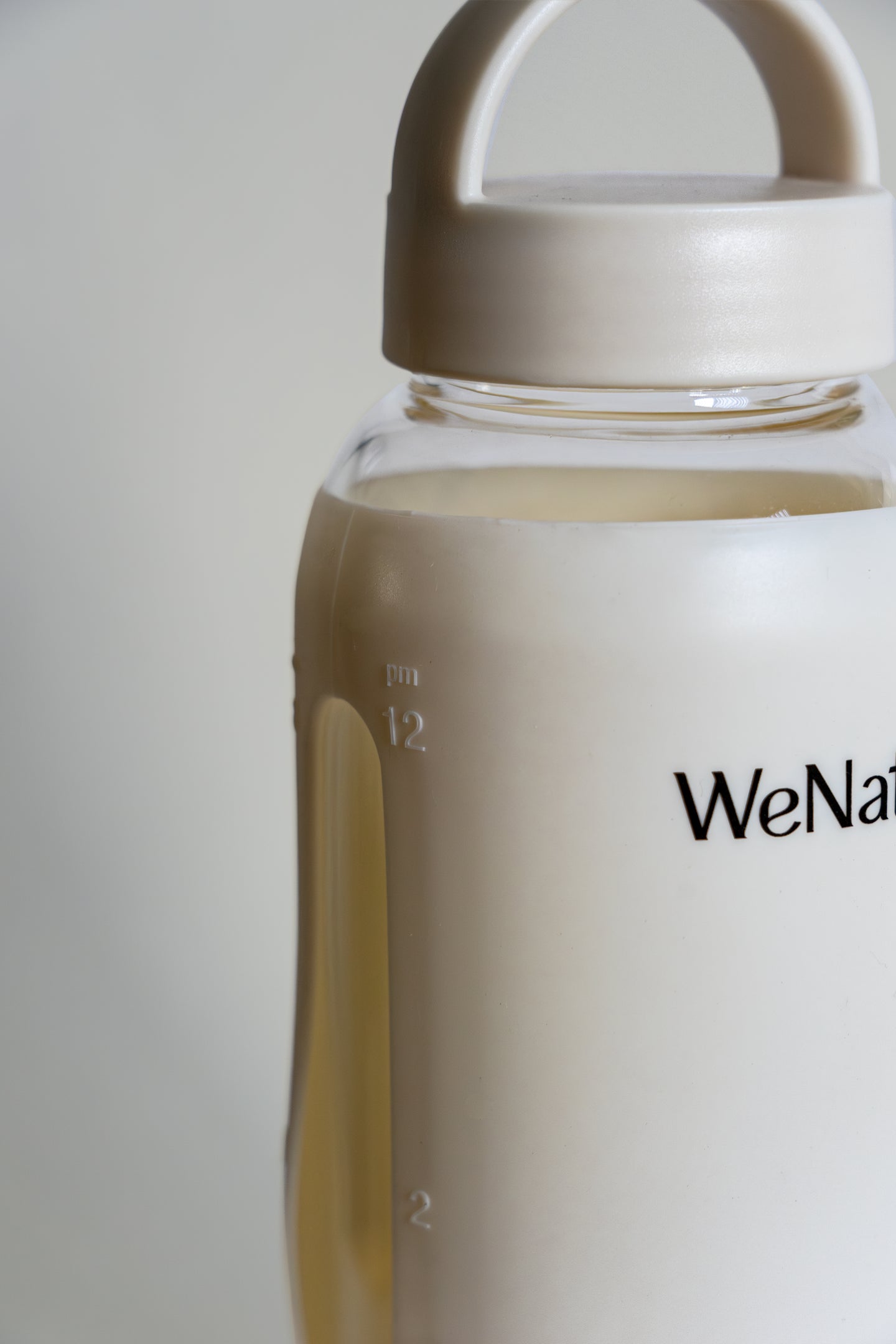 WeNatal waterbottle half body picture on a white background