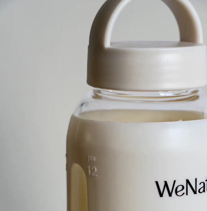 WeNatal water bottle close up shot with a white background