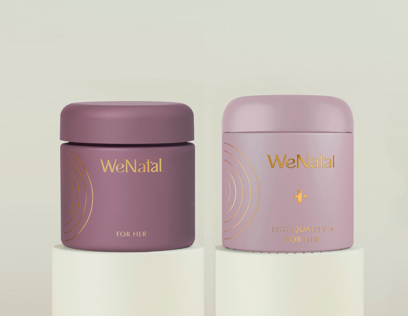 WeNatal for Her & Egg Quality + Duo Welcome Kit features two supplement jars, promoting women's fertility and egg quality, displayed on minimalist pedestals.
