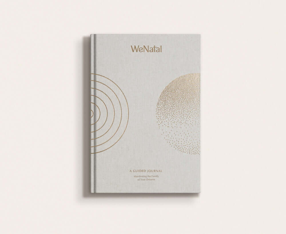 WeNatal Manifestation Journal on a white background
