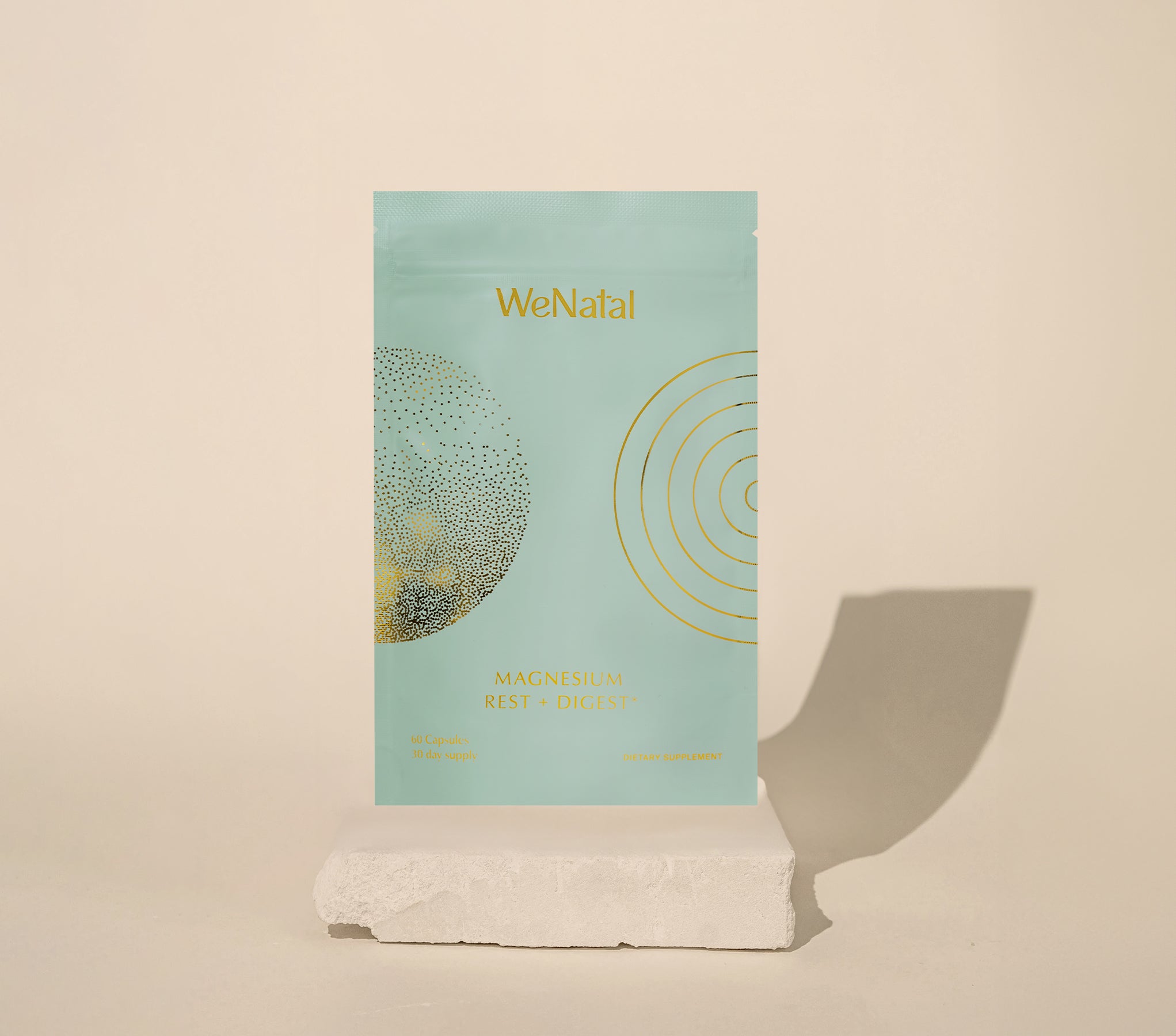 WeNatal Rest & Digest Magnesium Pouch, a dietary supplement offering daily prenatal nutrient support with 60 capsules to aid restful sleep and healthy digestion