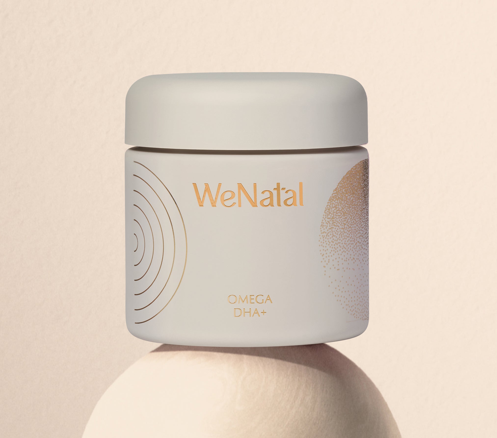 WeNatal Omega DHA+ Welcome Kit featuring a matte-cream jar with gold accents, offering a 30-day supply of prenatal nutrition and essential omega-3 DHA nutrient support