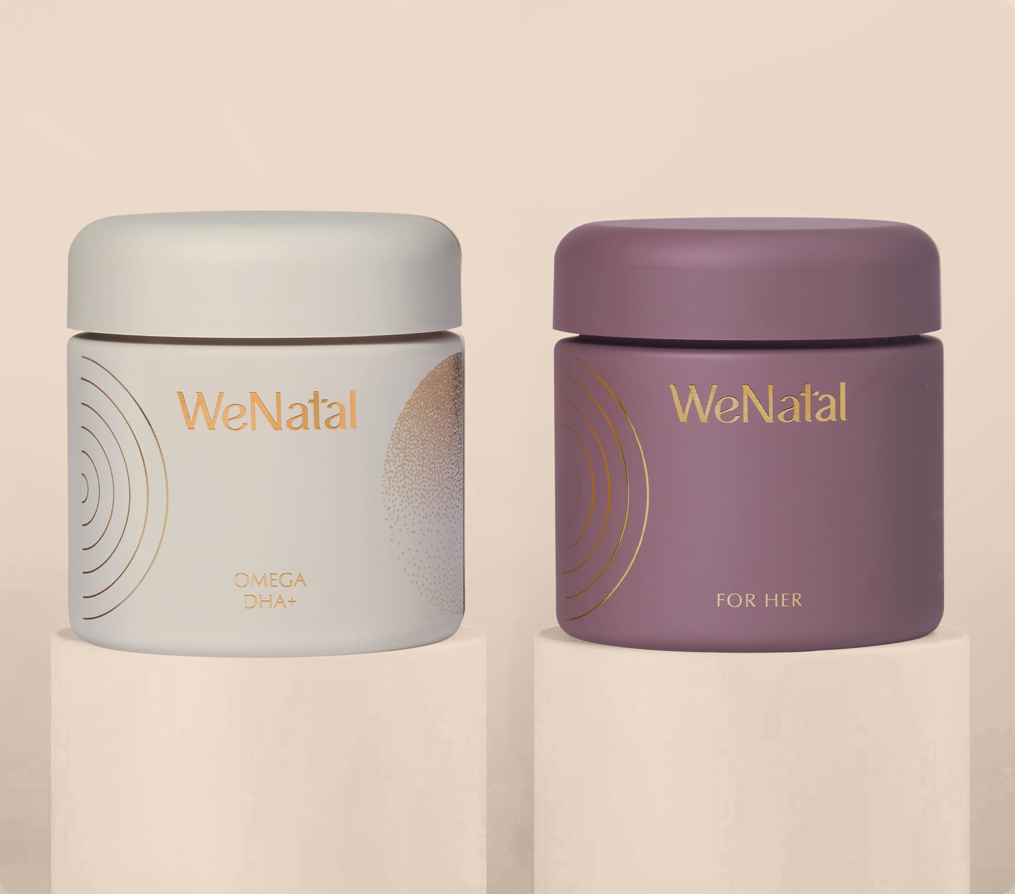 WeNatal for Her & Omega DHA+ Duo Welcome Kit; prenatal supplement jars offering daily nutrient and fertility support with omega-3 DHA in capsule formula.