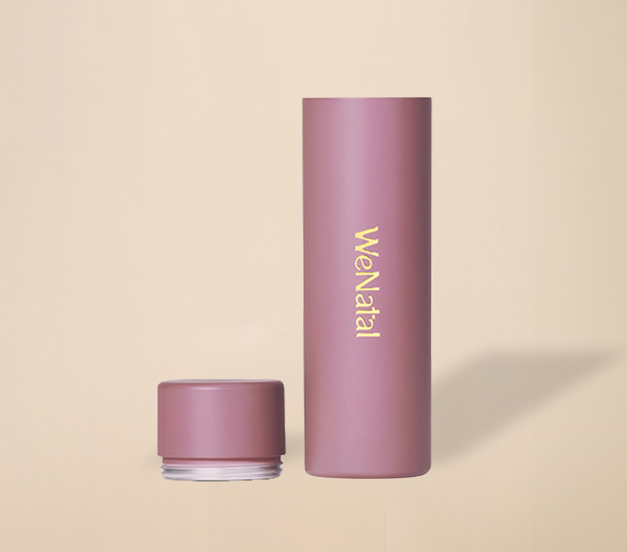 WeNatal Travel Vial Women's packaging for carrying prenatal supplement doses, offering daily nutrient and fertility support in a compact, eco-friendly design for travel