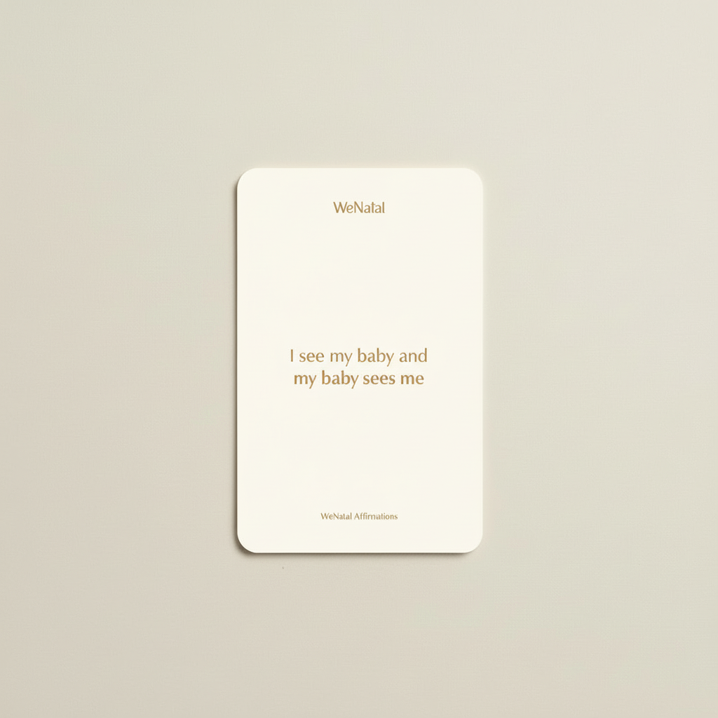 WeNatal Affirmation Card featuring the phrase “I see my baby and my baby sees me,” highlighting positive affirmations for new parents, with WeNatal branding.